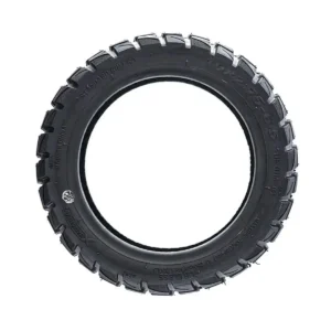 Neumático Xuancheng 10x2.75-6.5 tubeless offroad para patinete eléctrico, perfil lateral con tacos agresivos.