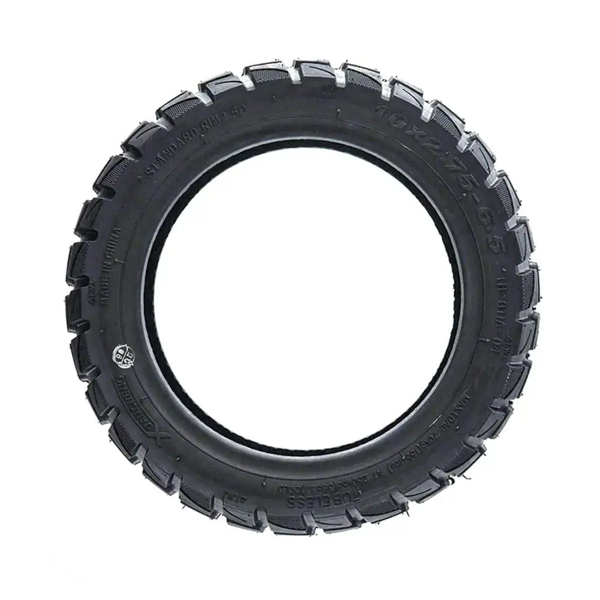 Neumático Xuancheng 10x2.75-6.5 tubeless offroad para patinete eléctrico, perfil lateral con tacos agresivos.