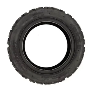 Neumático multitaco 80/65-6 (10x3) offroad para patinete eléctrico, perfil lateral mostrando flanco reforzado.
