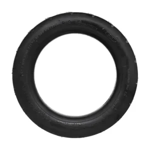Neumático CST 90/65-6.5 onroad tubeless reforzado para patinete eléctrico, perfil lateral mostrando estructura robusta.