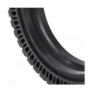 vista perfil de la rueda maciza 9x2.25 offroad para patinete eléctrico, diseñada con construcción perforada para mayor durabilidad y sin riesgo de pinchazos, en OmmviShop.